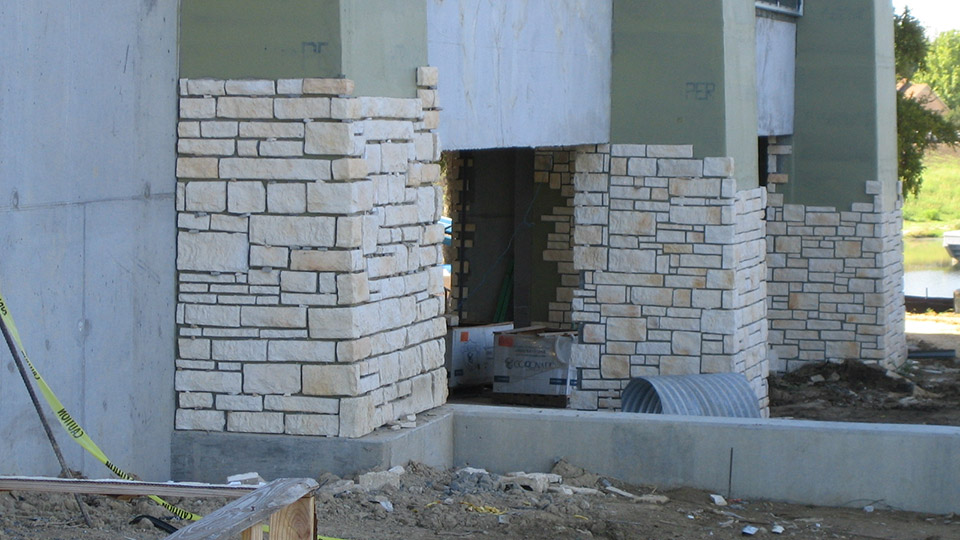 Figure 4. Shown is an example of manufactured adhered veneer installed over a fluid applied air and water assembly product that can accept a direct bond installation of veneer finishes. Photo courtesy of LATICRETE International, Inc.