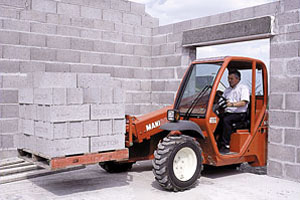 The Twisco SLT 415 by Manitou North America is the world's smallest telescopic handler.