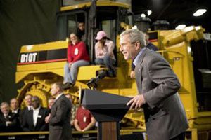 President Bush tours production facility, speaks to workers and calls Caterpillar one of the great American companies.
