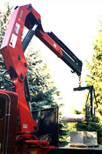 Using cranes for job site delivery of masonry materials can be a money saver.