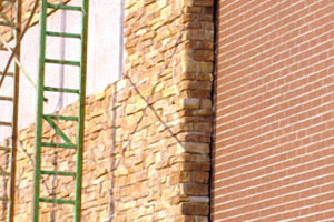 Manufactured stone and clay brick co-exist in this shopping mall under-construction in Olathe, Kan. Different masonry types in the same wall or structure can pose a challenge for post-construction clean down. Photo courtesy of Scott Buscher, PROSOCO.