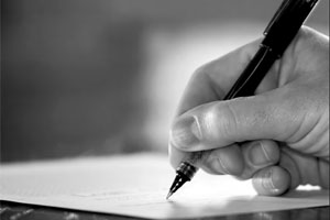 Get everything in writing and have a signed contract before proceeding with work. © Photographer: Lincolnrogers | Agency: Dreamstime.com