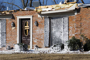 After a hurricane ripped through a Columbus, Ga., neighborhood, the brick walls of this home were left standing.  Photographer: Laura Clay-ballard | Agency: Dreamstime.com