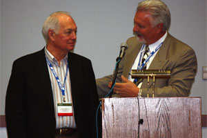 MCAA President Tom Daniel (right) annouces Frank Campitelli (left) as the 2009 C. DeWitt Brown Leadman Award winner.