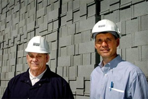 Plant manager Richard Asbell, left, is joined by Robert Allen, President of Fayblock Co.