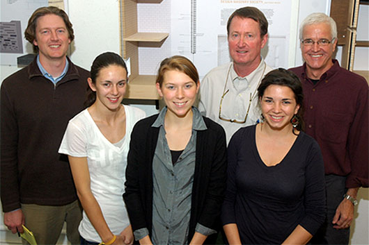 The North Carolina State University team of Erika Jolleys (second from left) of Manchester, England; Rebecca Hora (third from left) of Bridgewater, Conn.; and Ana Milliones (fourth from left) of Charlotte, N.C. NCMCA Past-president Doug Burton (third from right) and Matt Griffith (first on left), served as jurors.