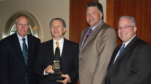 Congressman Wally Herger of California is presented the 2010 MCAA Freedom and Prosperity Award by (from left to right) Paul Odom, Congressman Herger, Mackie Bounds and Jeff Buczkiewicz, MCAA Executive Director.