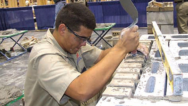 Cody Prescott works on his composite project at the 2010 national masonry contest.