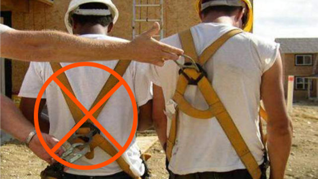 The worker on the right is wearing the harness correctly.