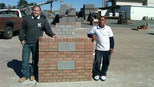 Scott Bryan (left) of Karon Masonry, Inc. with Rony O. Revolorio-Cascul (right).