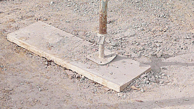 Photo 1: Short mud sills reduce shovel work and insure that they won’t be re-used for scaffold planks.