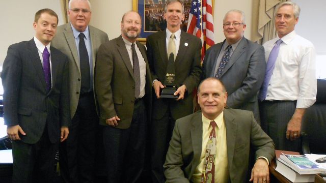 From left to right: Stephen Borg, John Smith, Steve Hunt, Congressman Dan Lipinski, Jim O’Connor, Jeff Buczkiewicz, and Mark Kemp
