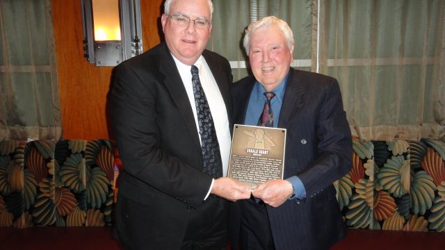MCAA Chairman John Smith (left) presents Donald Grant (right) with the Masonry Hall of Fame plaque