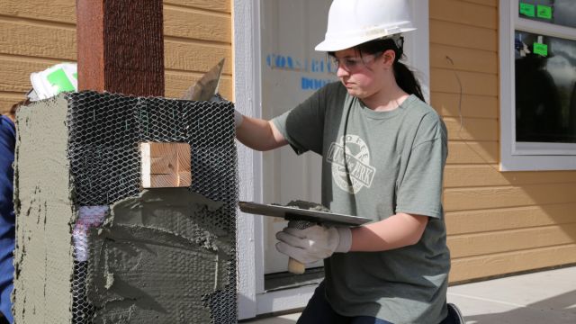 Kendra Guthrie works on a Habitat for Humanity home.