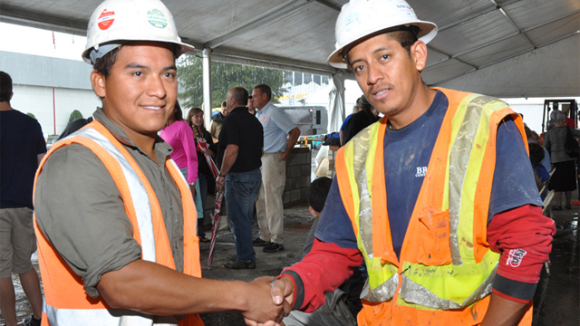 Brodie Contractors’ apprentices Fernando Olalde (left) and Juan Rodriguez congratulate each other on their First and Second place finishes respectively at the 59th Annual NC Department of Labor State Fair Apprentice Masonry Skills contest.