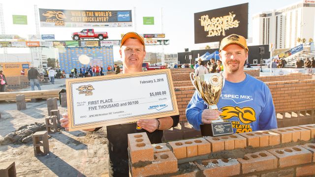 Scott Tuttle (right) and Brian Tuttle (left) with their winning wall at the 2016 SPEC MIX BRICKLAYER 500®.