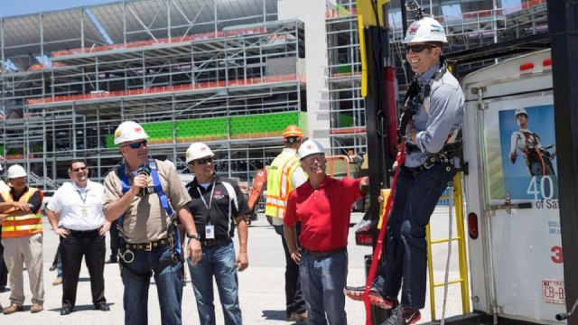 As part of a presentation on proper methods of fall prevention, Greg Biffle was outfitted in a safety harness and hoisted off the ground at the Daytona International Speedway.