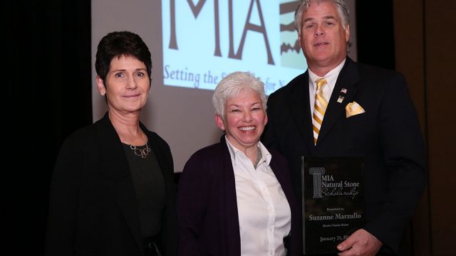 Suzanne Marzullo (center) accepts the 2015 MIA Natural Stone Scholarship Award from award sponsors Kathy Spanier (Coldspring) and 2015 MIA President Dan Rea (Coldspring).