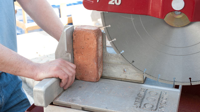 A more controlled cut is allowed, by preventing the blade from running up the brick.