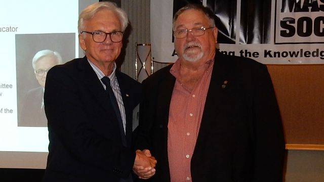 Daniel P. Abrams, left, recognized as as an Honorary Member of TMS by Jerry Painter, right.