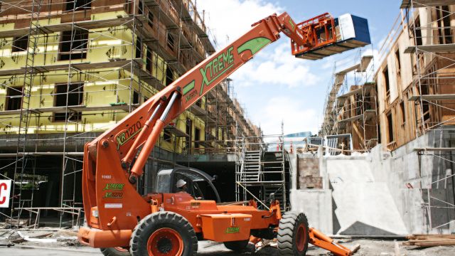 The XR1270 roller boom telehandler has a lift capacity of 12,000 pounds, a lift height of 70 feet, and a forward reach of 53 feet, 8 inches.