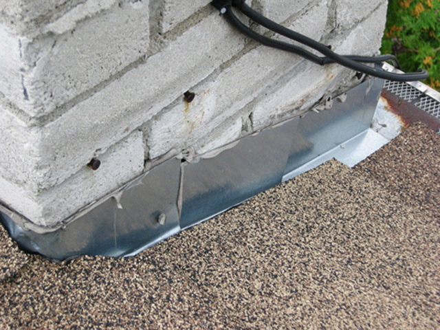 The counter flashing is missing on the side of this chimney.