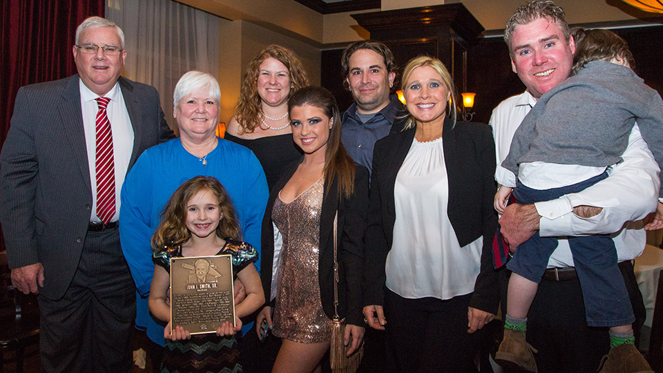 John J. Smith, Jr. (left) with family.