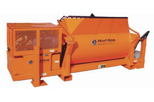 The Mud Hog Refractory/Precast Mixer was built with a hydraulic drive and dump with an adjustable height that can be adapted to load below the waist and to dump high into a delivery system.