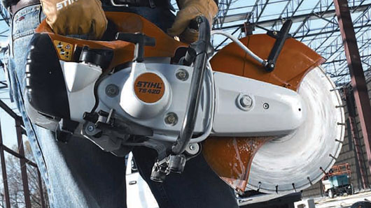 The Stihl TS 420 is equipped with a piston-controlled, stratified-charge engine that reduces emissions by 44 percent.