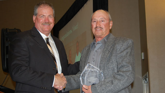 AMCA Treasurer Dave Endres (left) presents Vince Fallecker (right) with the AMCA Master Mason Award.