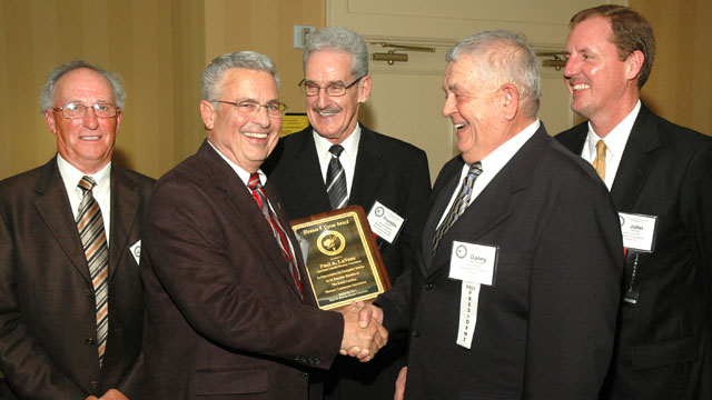 Paul A. LaVene is presented with the Eleanor F. Upton Outstanding Associate Member Award.