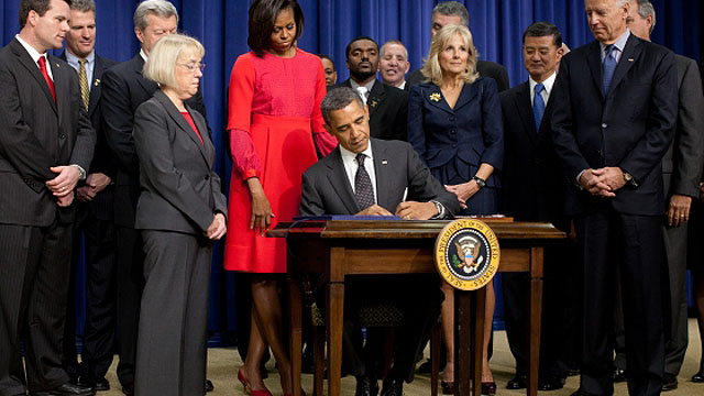 President Barack Obama signs the 3% withholding repeal into law.