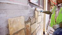 Adding drainage to stone veneers and adhered masonry