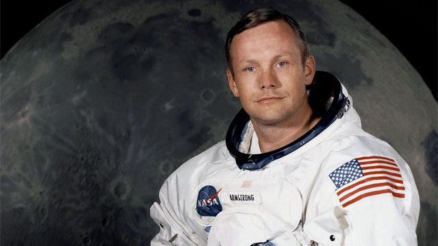 Portrait of Astronaut Neil A. Armstrong, commander of the Apollo 11 Lunar Landing mission in his space suit.
