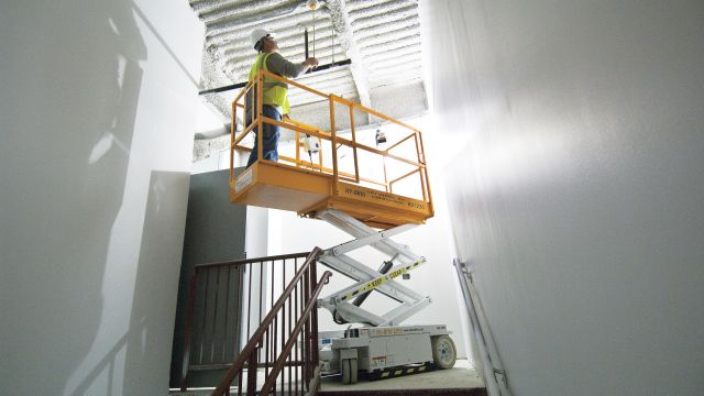 Operators can maneuver low-level access scissor lifts into spaces that might be too hazardous for ladders or scaffolding