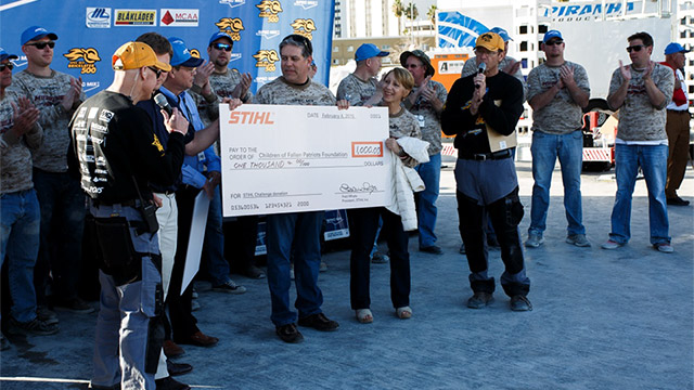 STIHL, a SPEC MIX BRICKLAYER 500 sponsor, presents a donation check to the Children of Fallen Patriots Foundation