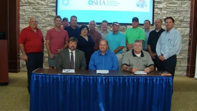 OSHA Area Director Bill McDonald and Eastern Missouri Laborers' District Council Business Manager Gary Elliott joined MCA President Tom McDonnell to sign a new 3-year safety and health partnership