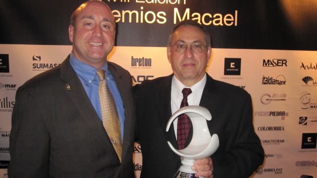 Tony Malisani and David Castellucci proudly hold the “Institution Award” at the Macael Awards event