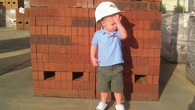 My 2-year-old nephew, Rowan, is shown on the brickyard at South Georgia Brick Co. on a hot day in Albany, Ga.