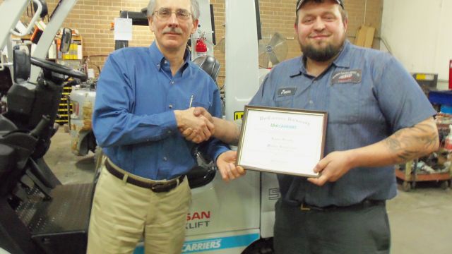 Jason Dorsey, master technician, is pictured with Keith Burke, service manager, Western Carolina Forklift