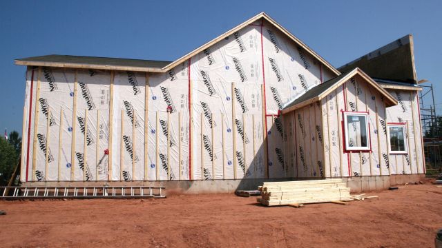 Building codes have required the use of WRBs like housewrap in the construction of frame buildings