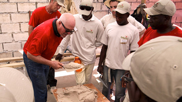 Avery Pratt training Okipe wall building for new homes for orphans and caregivers